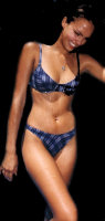 Jessica Alba in a bikini on a beach.. here's the first set of pictures of our website..