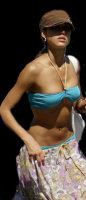 Jessica Alba in a bikini on a beach.. here's the first set of pictures of our website..